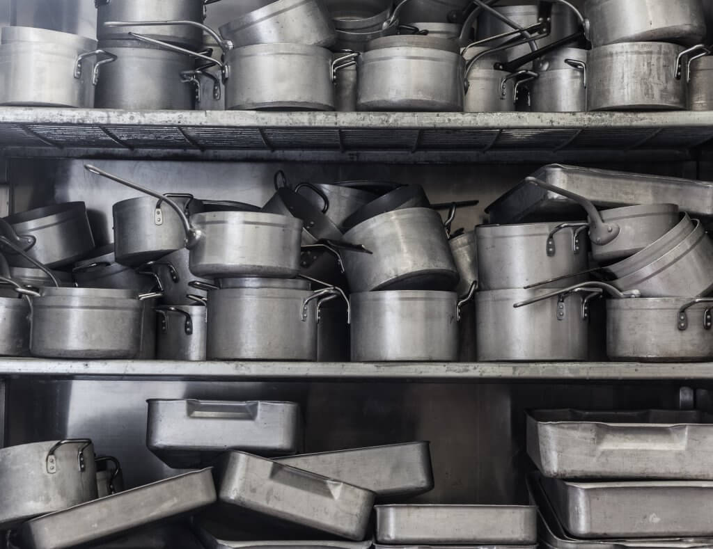 Shelf full of pots and pans