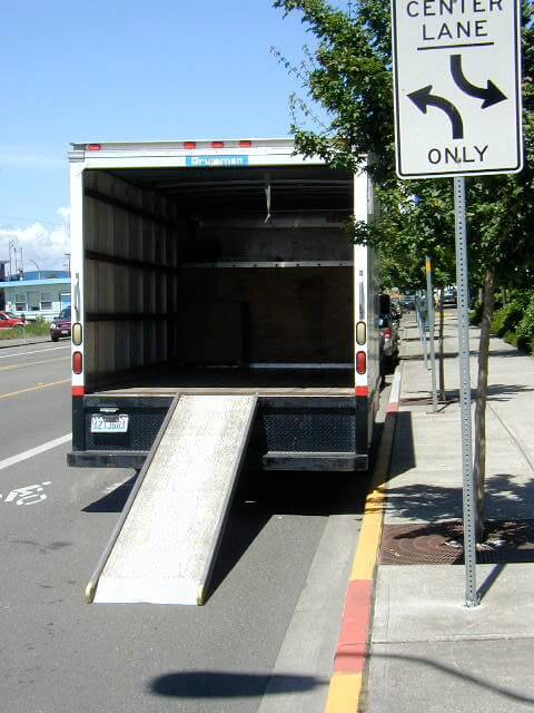 An open, empty moving truck.