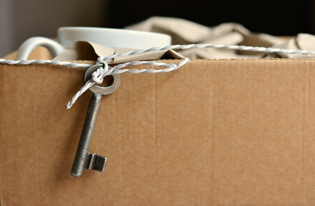 key tied to moving box