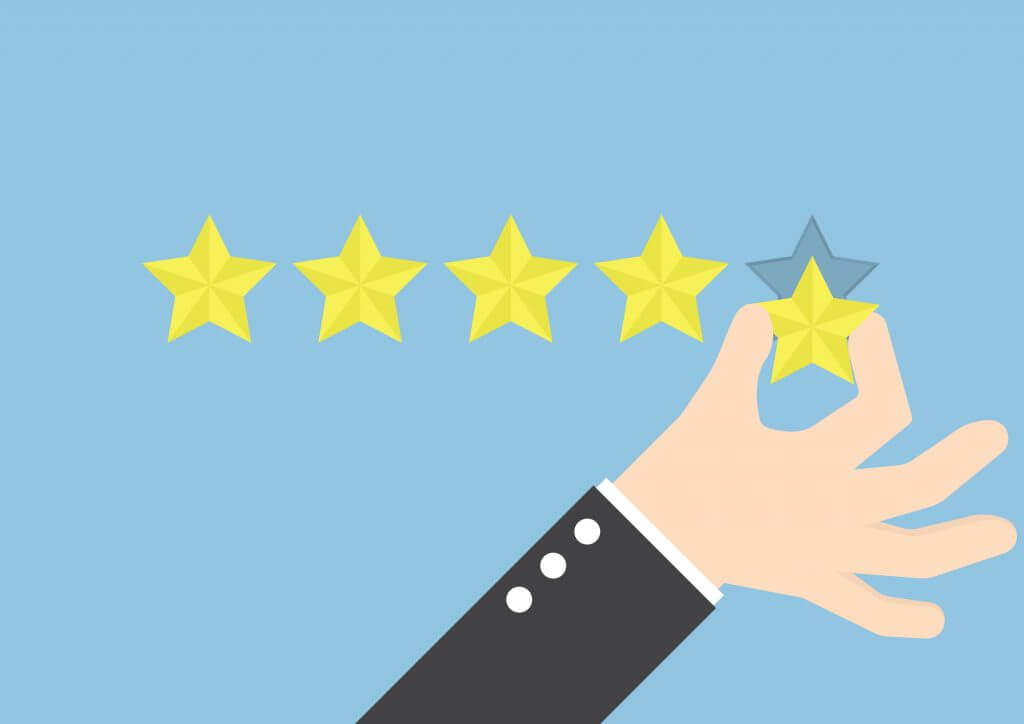 graphic of hand placing five stars on blue background