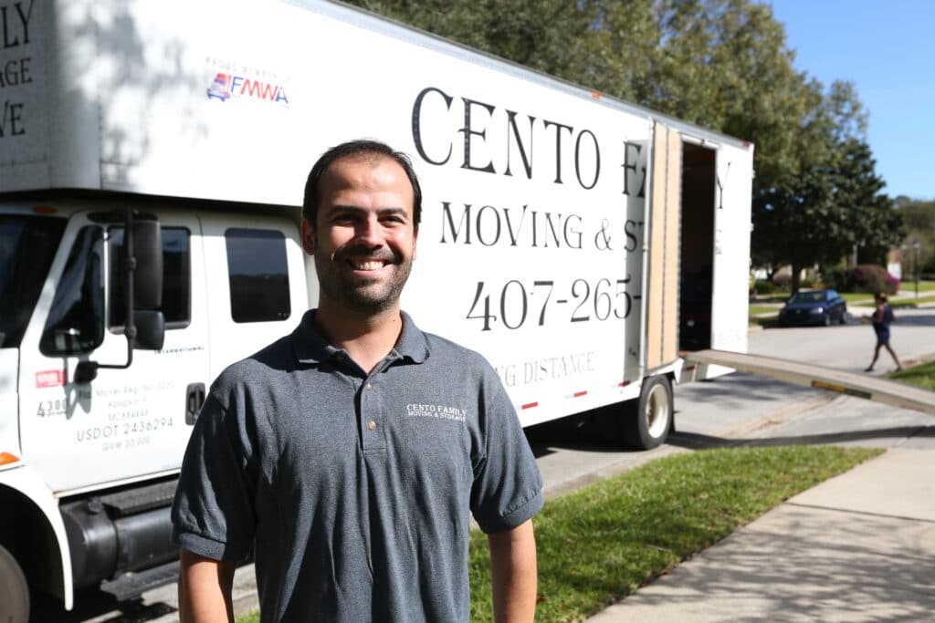 Mover standing in front of truck