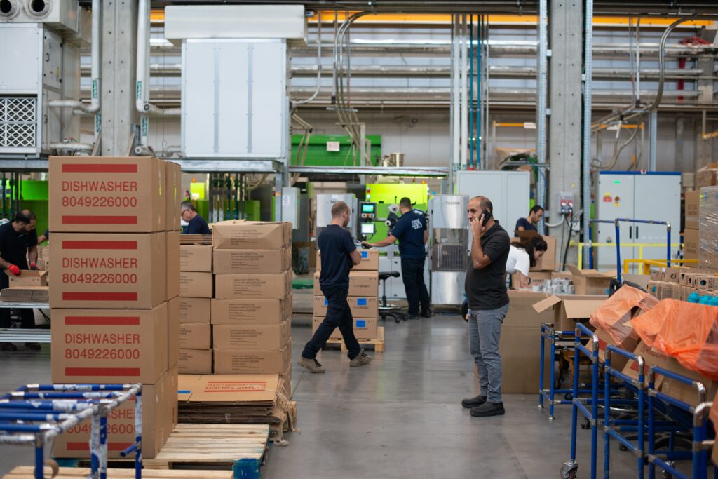 Warehouse with boxes and men working